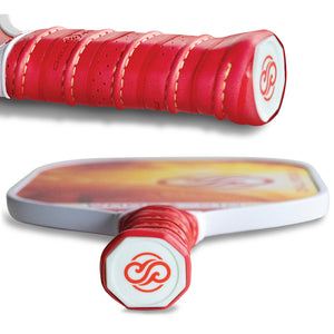 Close-up of Chill Pickle Woosa pickleball paddle handle grip and edge profile