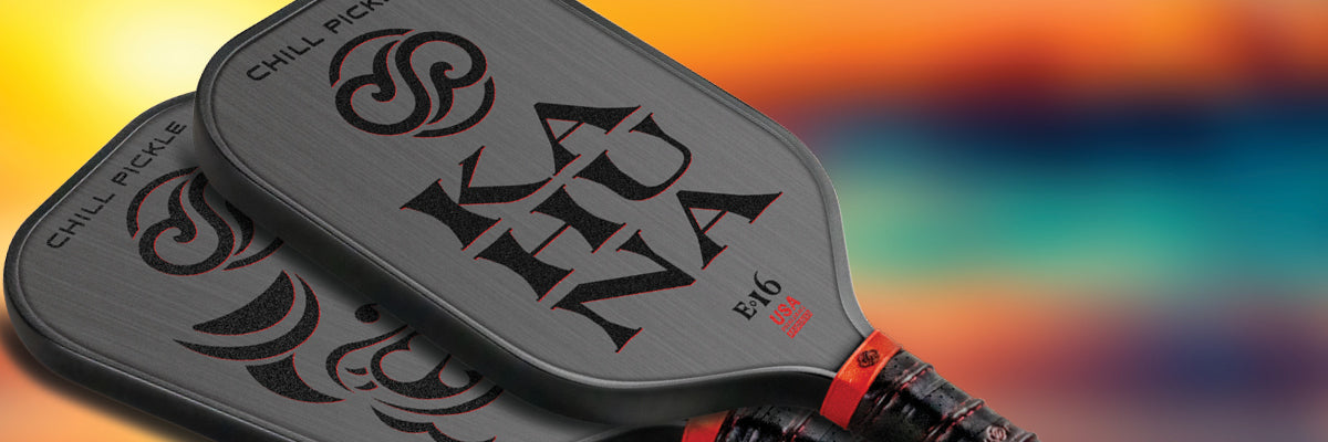 High-performance pickleball paddle banner with dark textured face and warm lighting