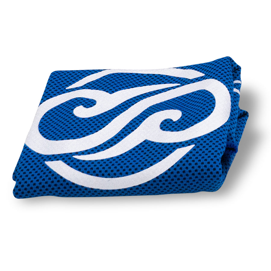 Folded blue and white Chill Pickle cooling towel with tropical swirl logo