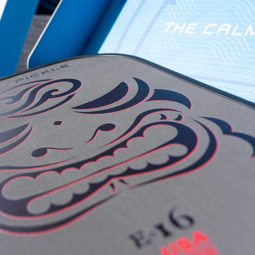 Chill Pickle Kahuna E-16 pickleball paddle surface detail showing raw carbon fiber texture and edge guard