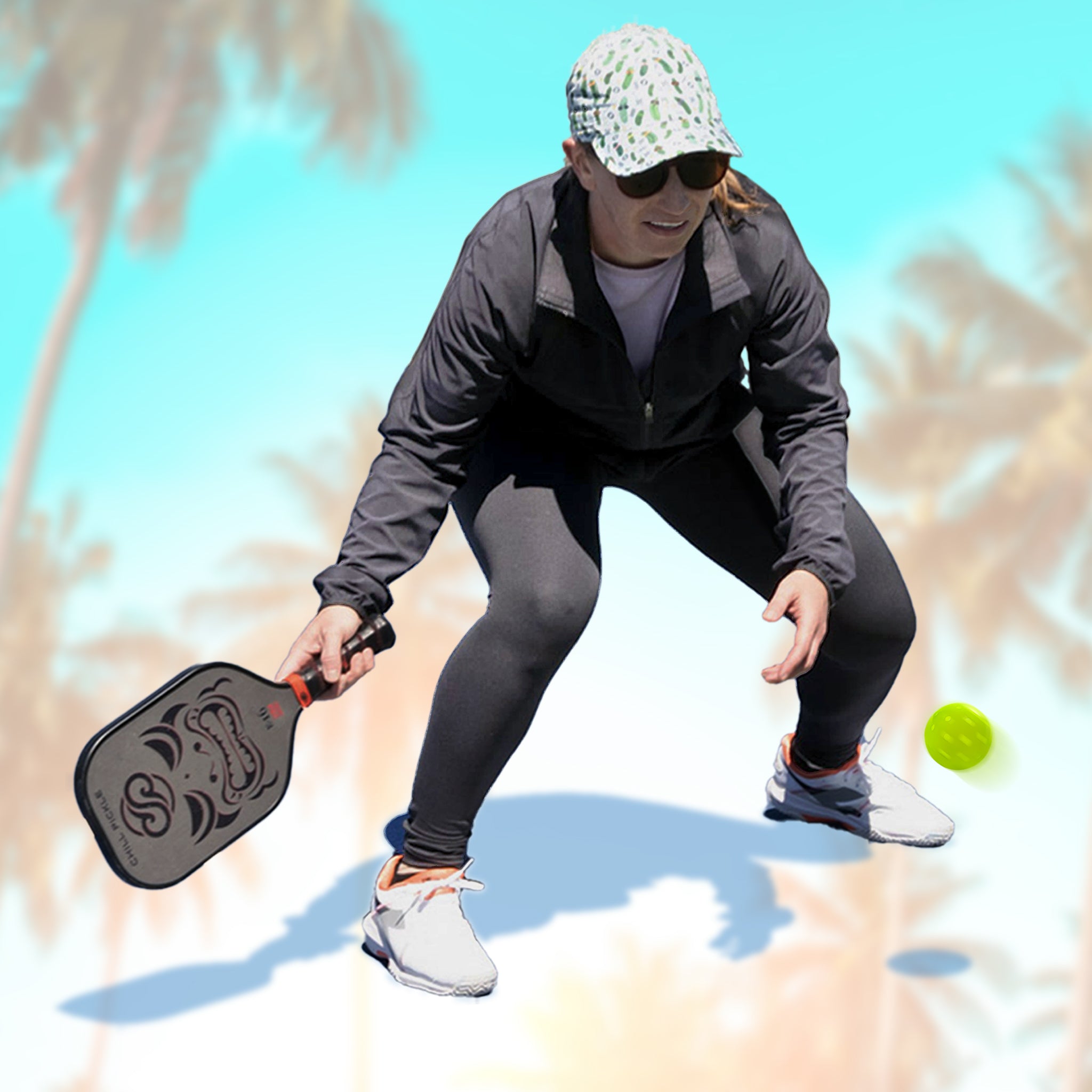Pickleball player hitting a controlled dink shot with a Chill Pickle Kahuna paddle at the net