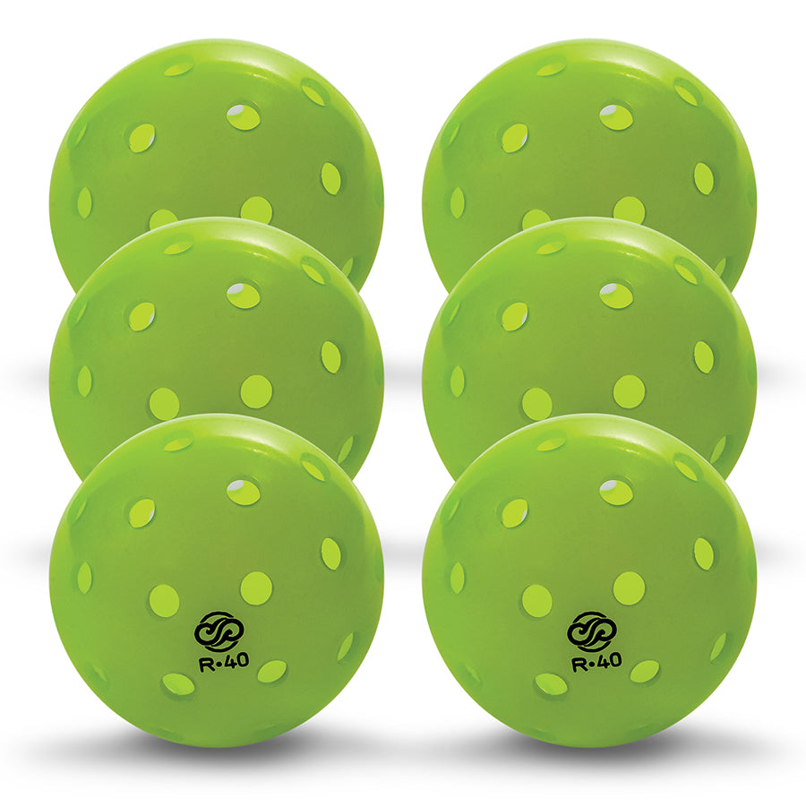 Clustered group of 6 Chill Pickle R40 outdoor pickleballs arranged in tight formation