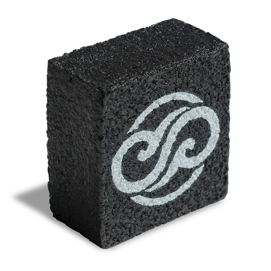 Side angle view of Chill Pickle pickleball paddle eraser block showing dense rubber cleaning material